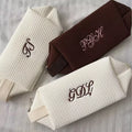 OEM Deep Embroidery Cosmetic Pouch Waffle Water Resistant Cosmetic Case Personalized Polyester Travel Makeup Pouch Zipper