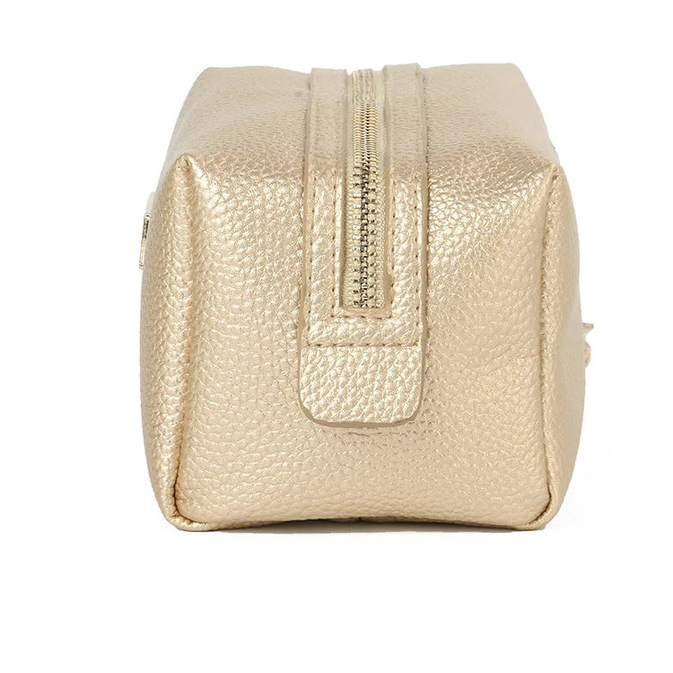 Wholesale Elegant Korean Travel Plain Faux Leather Makeup Pouch Gold Zipper Pink Cosmetic Bag With Tassel