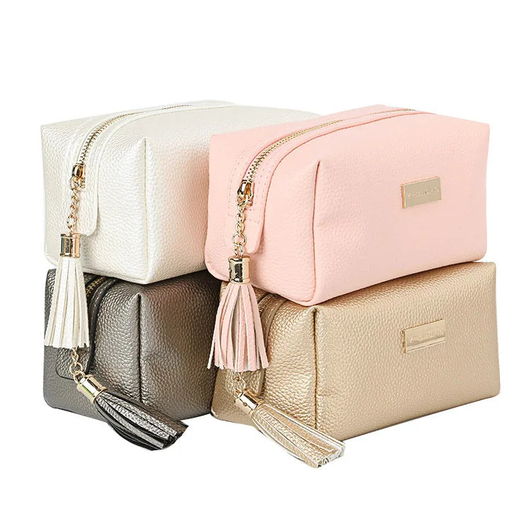 Wholesale Elegant Korean Travel Plain Faux Leather Makeup Pouch Gold Zipper Pink Cosmetic Bag With Tassel
